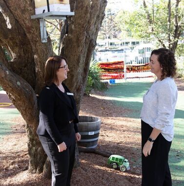 Kelly and Tracy under tree