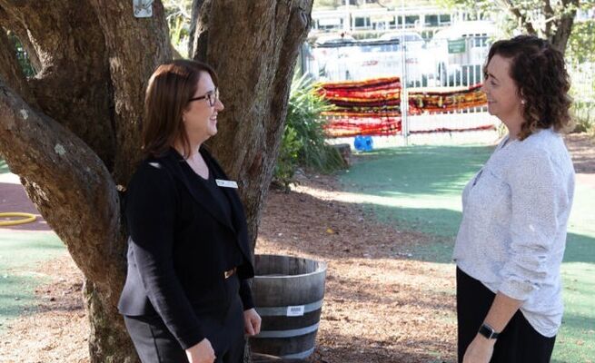Kelly and Tracy under tree